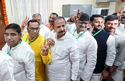 MLAs wait in a queue before voting in the Rajya Sabha polls, at Vidhan Sabha in Patna, Monday, March 16, 2026.