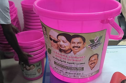 Flying squad seized plastic buckets stocked in AIADMK party Functionary hours on Thirumangalam area in Madurai.