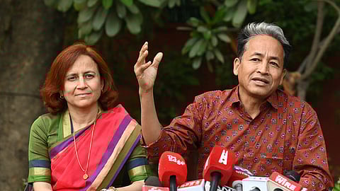 Climate activist Sonam Wangchuk with spouse Gitanjali J Angmo during a press conference, in New Delhi, Tuesday, March 17, 2026.