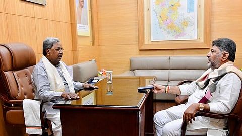 CM Siddaramaiah in conversation with DCM DK Shivakumar in Vidhana Soudha.