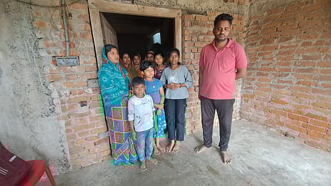 Family members of deceased Menaka Rout in their village