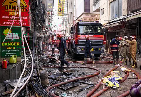 Rescue operations underway after a fire broke out in a residential building near Palam Metro station, in New Delhi, Wednesday, March 18, 2026. Nine people, including three children, were killed.