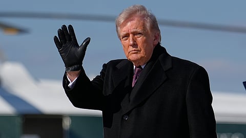President Donald Trump waves after arriving on Air Force One, Wednesday, March 18, 2026, at Joint Base Andrews, Md., after attending the casualty return at Dover Air Force Base, Del., for the six crew members of an Air Force refueling aircraft who died when their plane crashed in western Iraq while supporting operations against Iran.