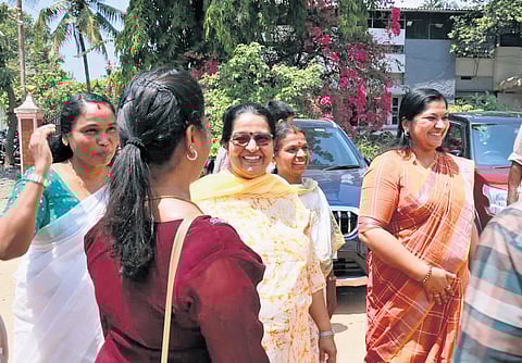 Thrikkakara sitting MLA and UDF candidate Uma Thomas seeking votes.