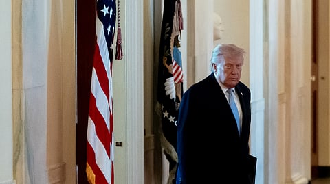 US President Donald Trump arrives for an event in the East Room of the White House, Friday, March 20, 2026, in Washington.