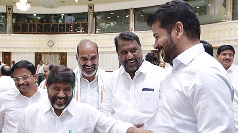 Deputy Chief Minister Mallu Bhatti Vikramarka shares a lighter moment with Chief Minister A Revanth Reddy after presenting the state budget for the financial year 2025-26 at Assembly in Hyderabad.