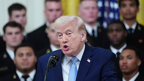 US President Donald Trump speaks during the Commander-in-Chief's Trophy presentation with the Navy Midshipmen football team in the East Room of the White House, Friday, March 20, 2026, in Washington.