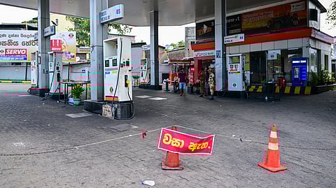 A sign reading 'Closed' is displayed at a Lanka IOC fuel station in Kotahena on the outskirts of Colombo on March 17, 2026.