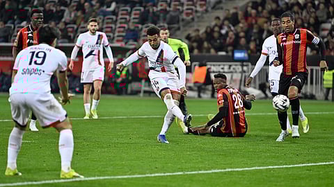 PSG's Desire Doue scores his side's second goal during the French League One soccer match between Nice and Paris Saint-Germain in Nice, France, Saturday, March 21, 2026.