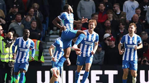 Brighton's Danny Welbeck celebrates after scoring during the English Premier League soccer match between Brighton and Liverpool in Brighton, Saturday, March 21, 2026.