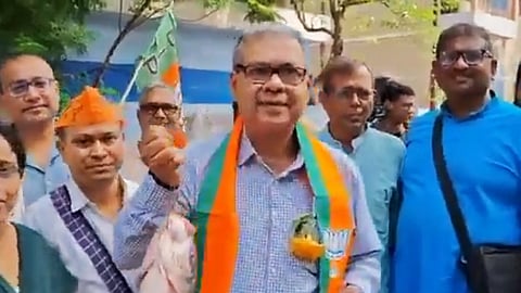 BJP candidate campaigns with fish in Bengal, rebuts TMC’s non-veg ban claims