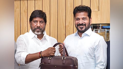 Telangana CM Revanth Reddy with state Deputy Chief Minister and Finance Minister Sri Bhatti Vikramarka with the state Annual Budget 2026-27.