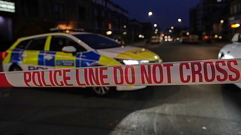 Police blocks a road in London, Monday, March 23, 2026 after an apparent arson attack on four vehicles belonging to a Jewish ambulance service, Hatzola Northwest, in London.