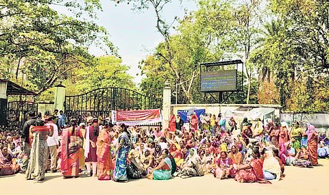 Anganwadi teachers holding dharna before collectorate in Sangareddy on Monday