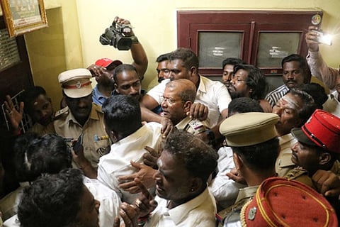Supporters of former Puducherry Chief Minister V Narayanasamy staged a protest and besieged the residence of PCC president on Monday, March 23, 2026.