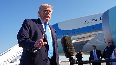President Donald Trump speaks with the media before boarding Air Force One, Monday, March 23, 2026, at Palm Beach International Airport in West Palm Beach, Fla.