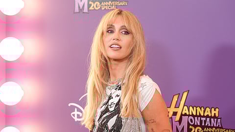 Miley Cyrus arrives at the premiere of "Hannah Montana 20th Anniversary Special" on Monday, March 23, 2026, at El Capitan Theatre in Los Angeles.