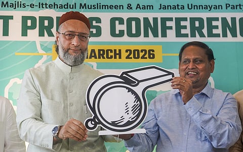 All India Majlis-e-Ittehadul Muslimeen (AIMIM) President Asaduddin Owaisi, left, and Aam Janata Unnayan Party (AJUP) Chief Humayun Kabir.