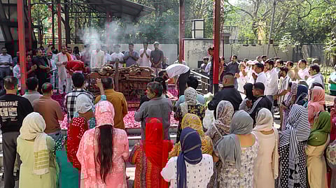 Family members of Harish Rana, the first person in India to be allowed passive euthanasia, during his last rites at Green Park Cremation Ground in New Delhi, Wednesday, March 25, 2026.