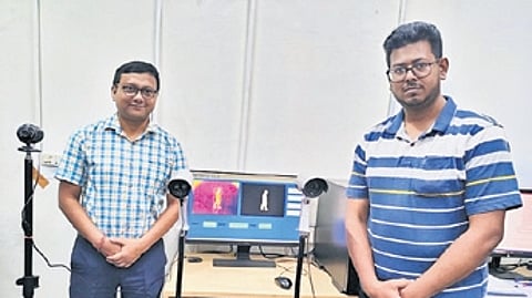 Prof Ari and research scholar Junaid with their smart surveillance system