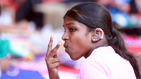Differently abled students interacting sign languages during the work experience category at the state school science fair at Alappuzha