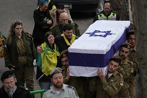 Israeli soldiers carry the flag-draped casket of Staff Sgt. Ori Greenberg who was killed in combat in Lebanon, during his funeral at Mount Herzl military cemetery in Jerusalem Thursday, March 26, 2026.