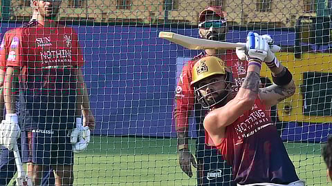 Virat Kohli trains on the eve of the IPL opener between RCB and SRH at the M Chinnaswamy Stadium in Bengaluru, on Friday