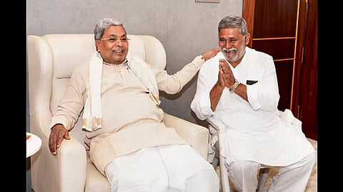 Karnataka chief minister Siddaramaiah with Sadiq Pailwan in Bengaluru on Friday.