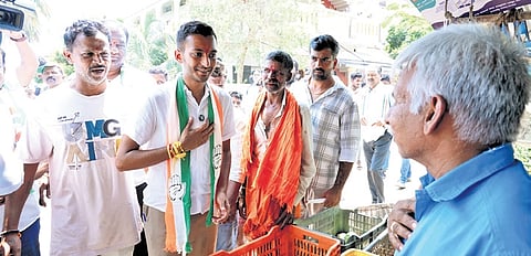 Congress’ Samarth Shamanur meets people during his campaign on Saturday