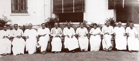 EMS with his ten ministers from the 1957 cabinet.