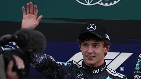 Mercedes driver Kimi Antonelli of Italy waves after the qualifying session of the Japanese Formula One Grand Prix at the Suzuka Circuit in Suzuka, Japan, Saturday, March 28, 2026.