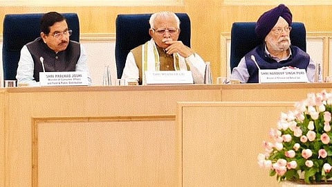 Union ministers Pralhad Joshi, Manohar Lal and Hardeep Singh Puri, attending a roundtable review meeting to deliberate on the expansion of PNG services.