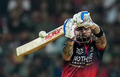 Royal Challengers Bengaluru's Virat Kohli plays a shot during an Indian Premier League 2026 T20 match between Royal Challengers Bengaluru and Sunrisers Hyderabad, at the M Chinnaswamy Stadium, in Bengaluru.