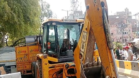JCB machine that ran over the victim in northwest Delhi on Saturday.