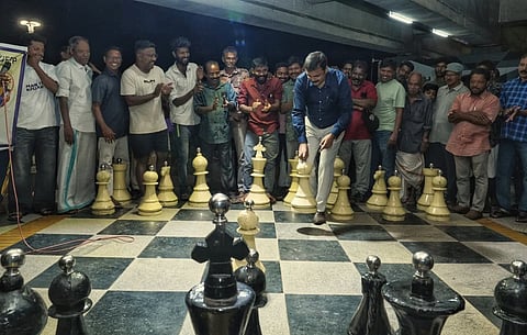 District Collector N Devidas playing chess at We Park, Kollam, as part of an initiative to raise democratic awareness