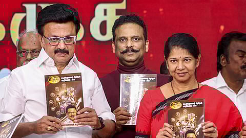 DMK President and Tamil Nadu Chief Minister MK Stalin, left, party leader Kanimozhi Karunanidhi, right, with others during the release of party manifesto.