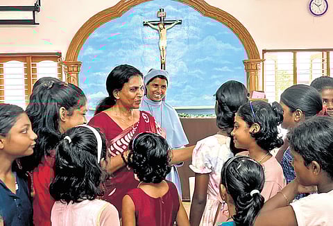 BJP candidate for Vattiyoorkavu R Sreelekha interacting with children at St Joseph’s Orphanage in Moonnammoodu, Thiruvananthapuram