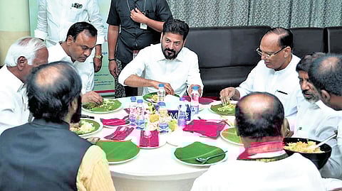 Chief Minister A Revanth Reddy has lunch along with ministers and legislators in the Assembly in Hyderabad on Monday, marking one year of the Sanna Biyyam scheme
