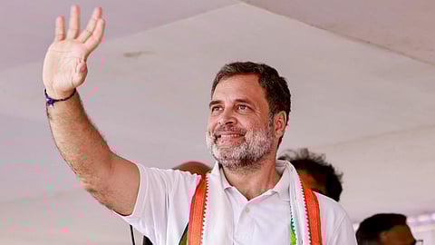 Congress leader Rahul Gandhi greets supporters during a public meeting in support of UDF candidates for the upcoming Kerala Assembly elections, at Puthuppally, in Kottayam district.