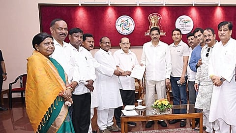 Opposition leaders handing a memorandum to Governor Hari Babu Kambhampati