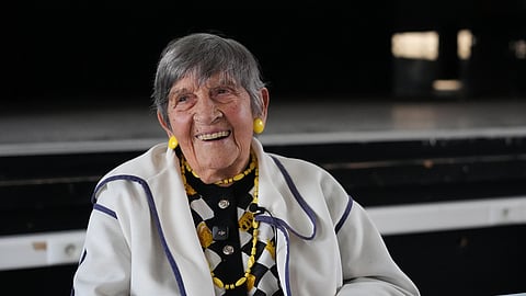 Ginette Kolinka, a 101-year-old survivor of Auschwitz, smiles after a meeting with pupils in a Paris-region high school in Saint-Maur-des-Fosses, outside Paris, France, March 21, 2026.