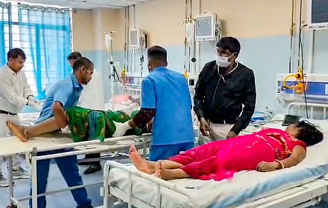 Injured persons receive treatment at a hospital after a stampede at the Maa Sheetla Mandir, in Nalanda district, Bihar, Tuesday, March 31, 2026.