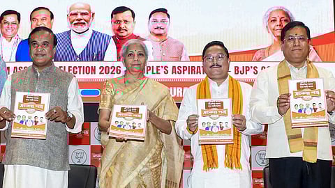 From left, Assam Chief Minister Himanta Biswa Sarma, Union Finance Minister Nirmala Sitharaman, state BJP president Dilip Saikia and Union Minister of Ports, Shipping and Waterways Sarbananda Sonowal during the Bharatiya Janata Party Assam unit's election manifesto release ahead of the state Assembly elections, at the party's state headquarters, in Guwahati, Tuesday, March 31, 2026.