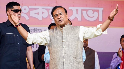 Assam Chief Minister Himanta Biswa Sarma addresses a public rally in support of NDA candidate for Dimoria constituency Tapan Das, unseen, ahead of the Assam Assembly Election, in Kamrup Metropolitan district, Tuesday, March 31, 2026.