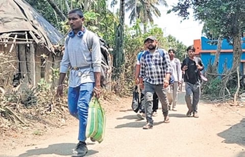 Migrant workers going back to their native villages from Paradip