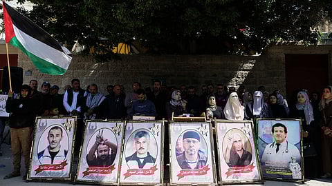 Relatives of Palestinian prisoners held in Israeli jails demonstrated against the decision by Israel's parliament to approve the death penalty for Palestinians convicted of murdering Israelis in front of the Red Cross headquarters in Gaza City, Tuesday, March 31, 2026.
