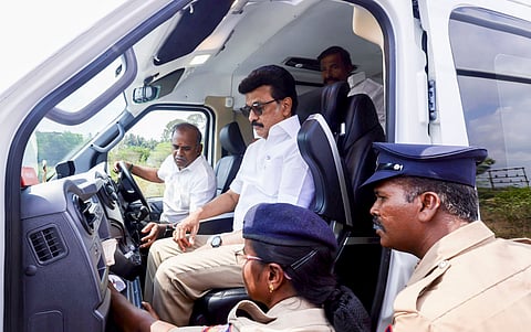 Election flying squad officials check the vehicle of Tamil Nadu Chief Minister MK Stalin at Saliamangalam junction on the Tiruchi-Nagapattinam highway as he proceeds to Tiruvarur for an election campaign, in Tiruchirappalli, Tuesday, March 31, 2026.