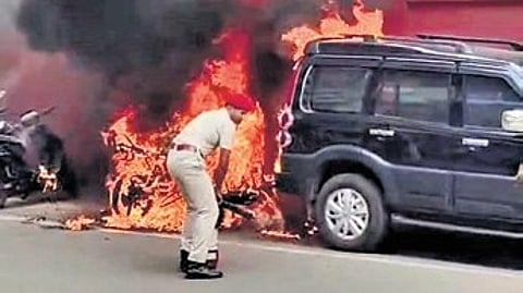 Video grab of fire services personnel dousing the blaze