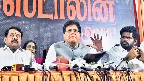 BJP TN in-charge Piyush Goyal, along with Nainar Nagenthran (L) and K Annamalai (R), during a press meet in Chennai.