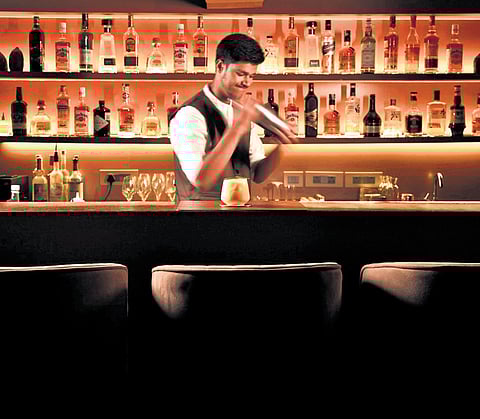 At POD, a bartender getting ready for the night